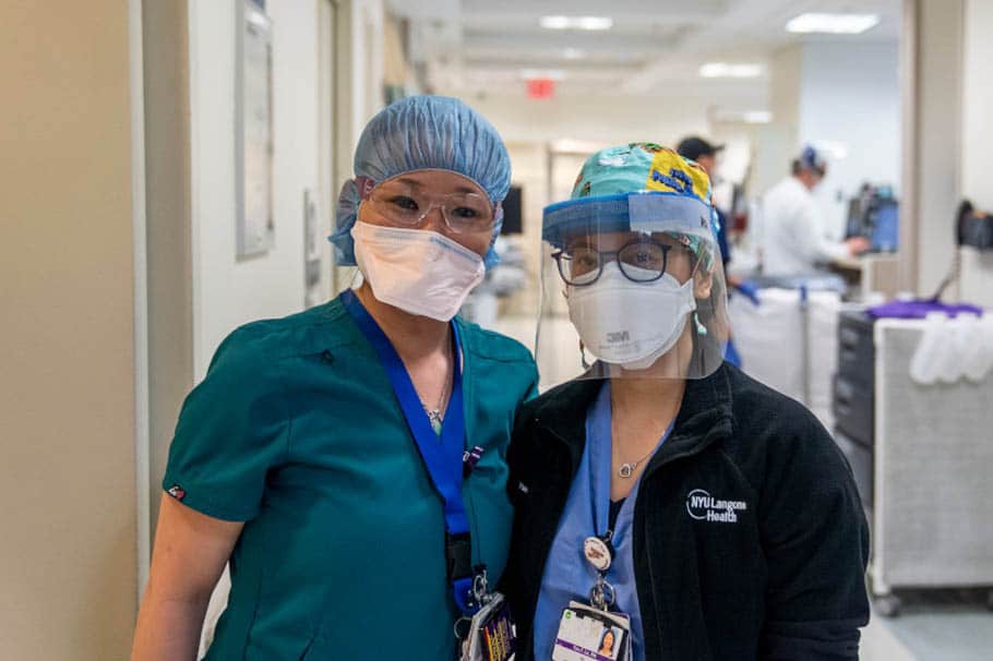 Dr. Chantelle Coble with another doctor or nurse in the hallways of NYU Langone Hospital