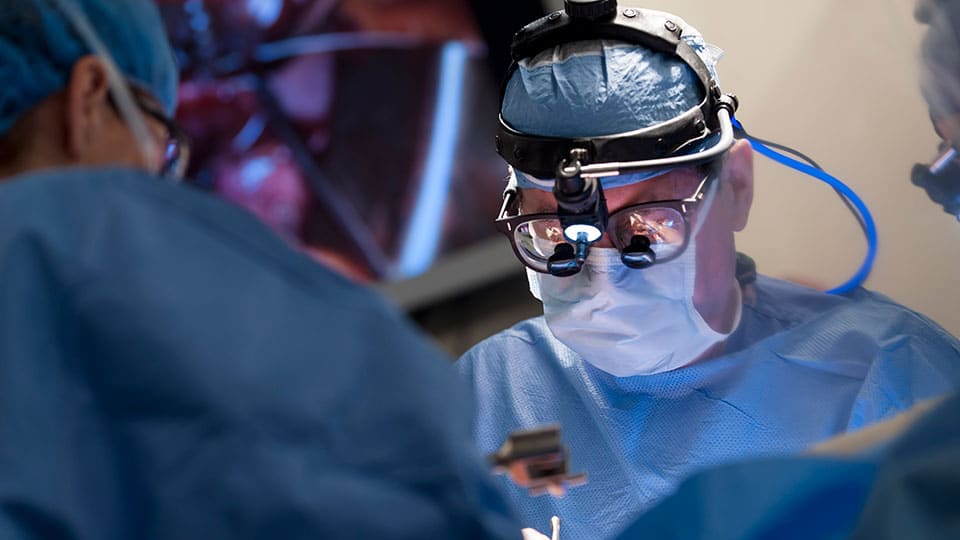 Cardiac surgeon Dr. Aubrey C. Galloway performs mitral valve surgery.
